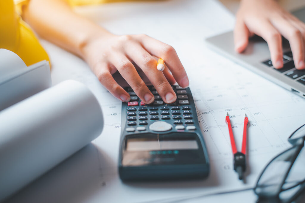 engineer working in office with blueprints, inspection in workp